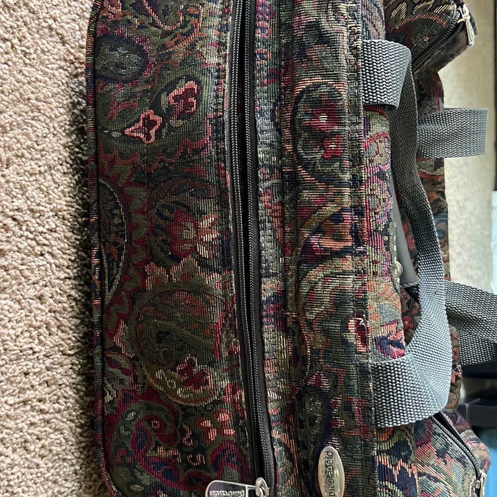 Vintage Pierre Cardin traveling bag..used but still in good shape.